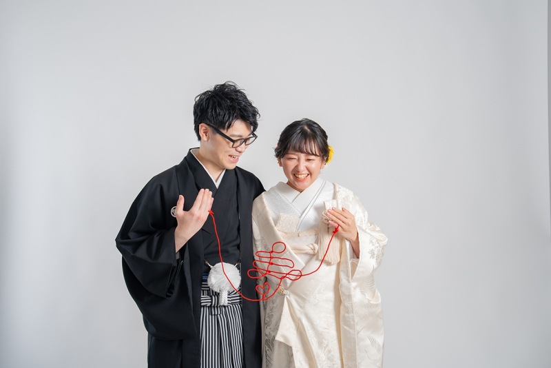 赤い糸がつなぐ笑顔