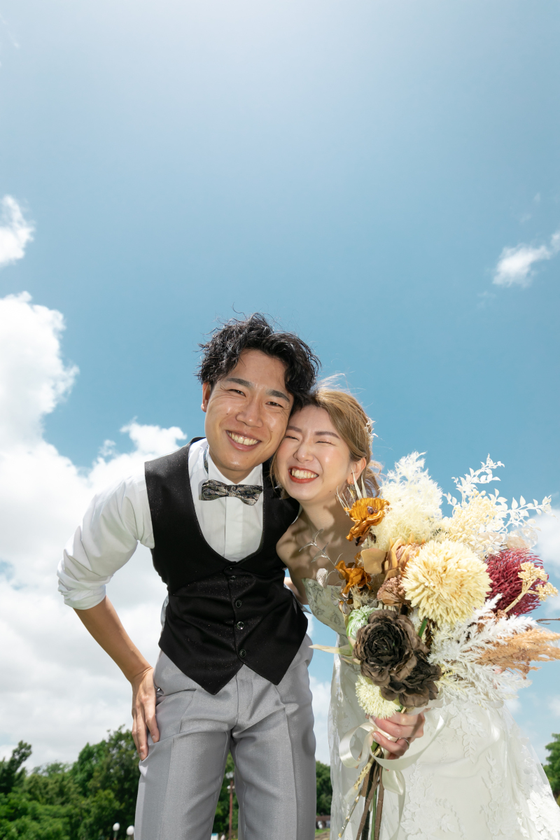 青空をバックに満点笑顔!