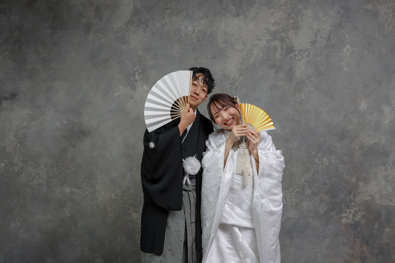 扇子からひょっこりでてきた表情は