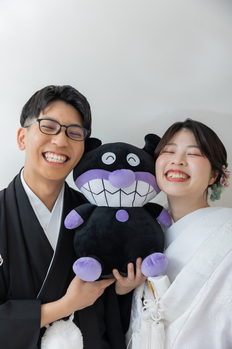 人形と