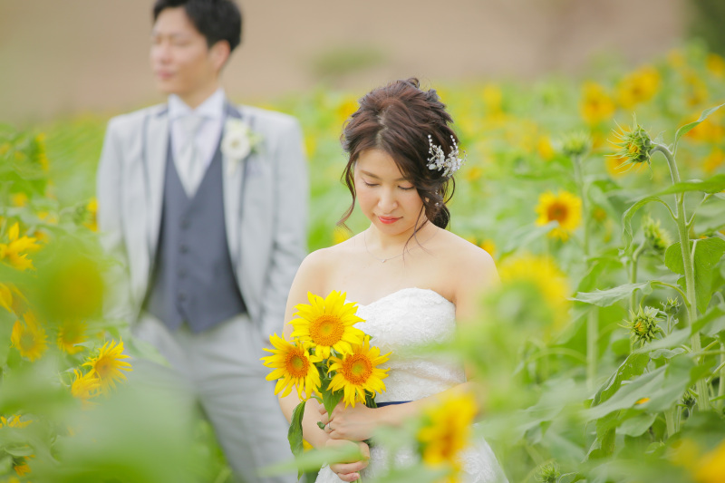 後ろの御新郎様も