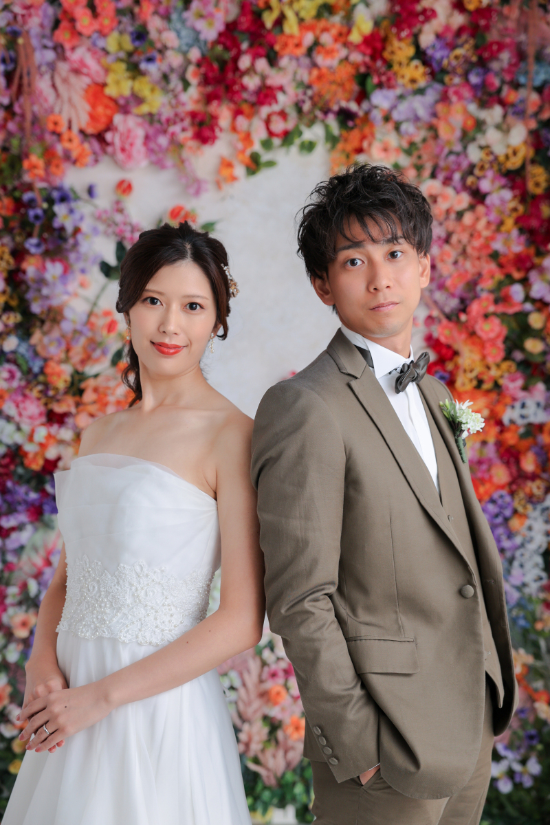 背中合わせで。