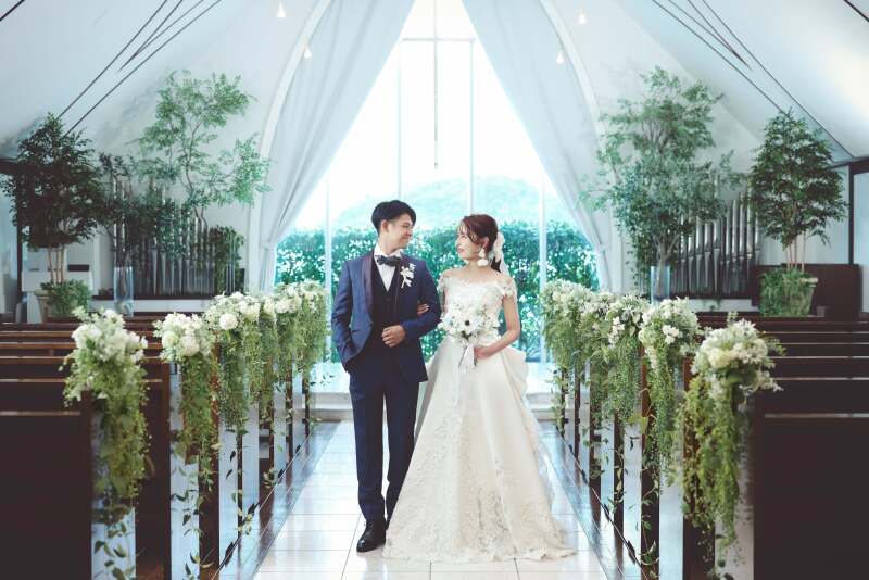 お母さまからのプレゼントブーケを持って。