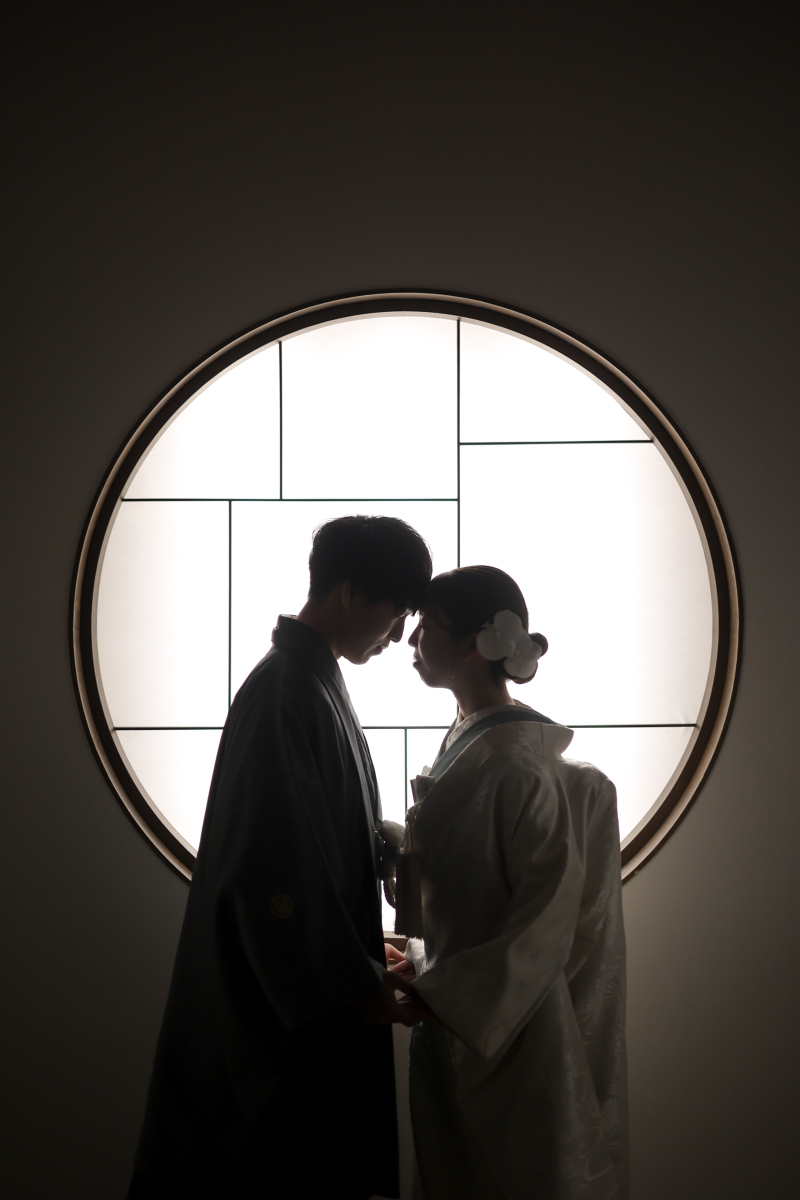 円窓に映る誓い