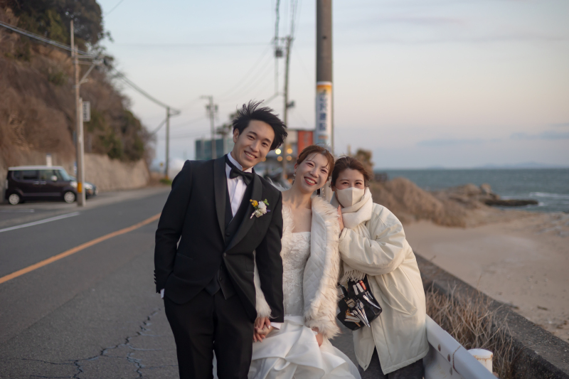 海風と笑顔の記念写真