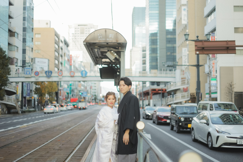 路面電車の駅にて