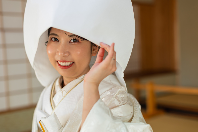 綿帽子に秘めた微笑み