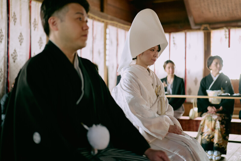 家族に見守られながらおこなわれた神前式