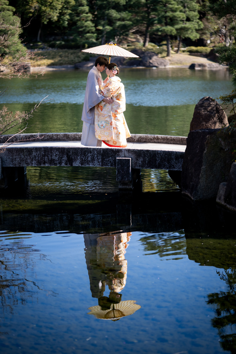 池に写り込むお二人