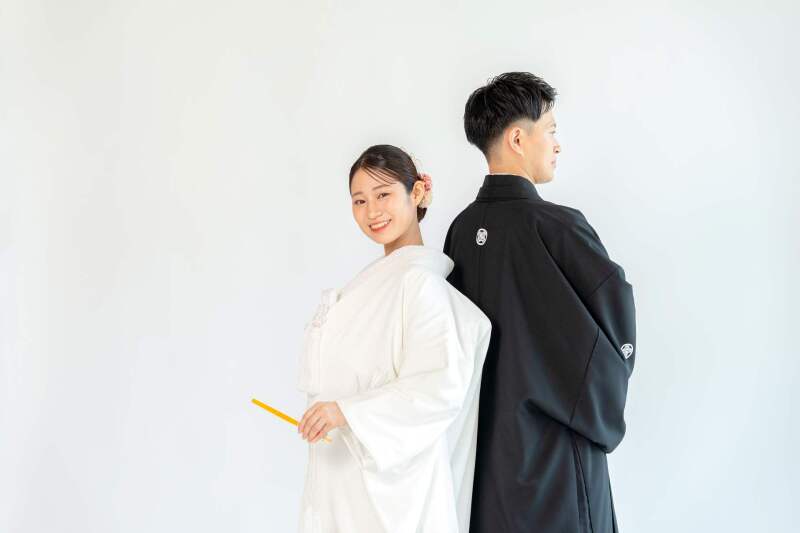背中合わせ