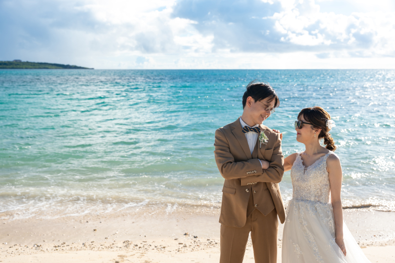 サングラス越しの笑顔が素敵な一枚