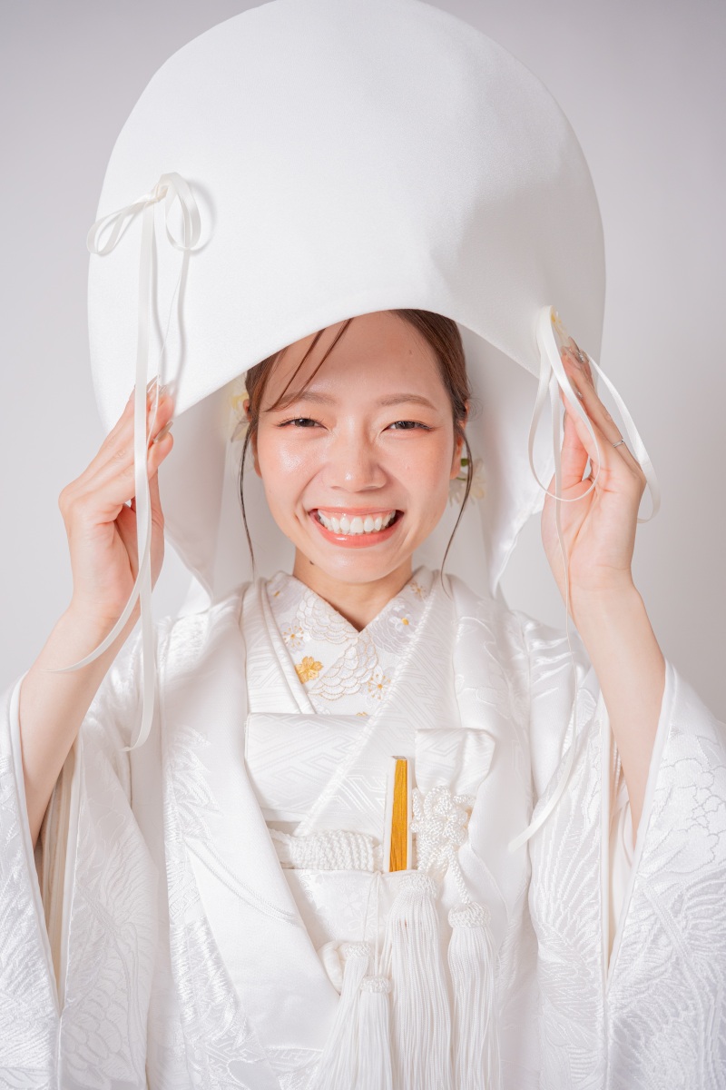 綿帽子で笑顔咲く