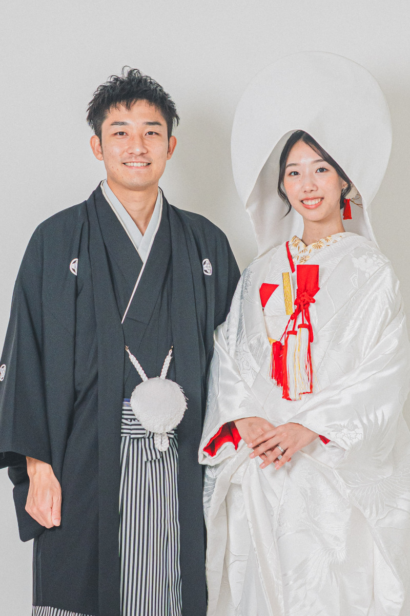 綿帽子を纏った伝統美あふれるワンシーン