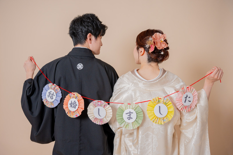 背中で伝える「結婚しました」