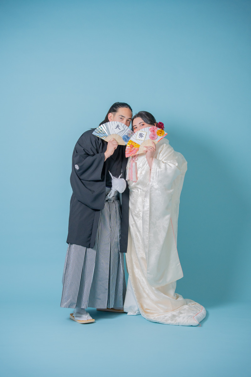 夫と妻、扇子で遊び心を