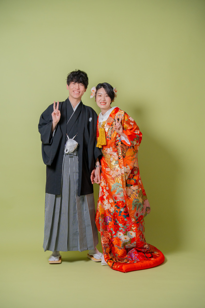 笑顔のピースサイン