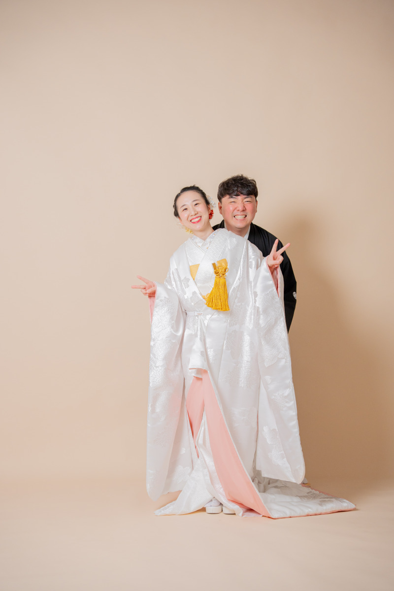 背中合わせのダブルピース